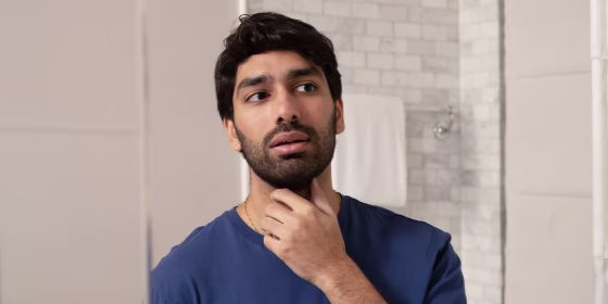 Man touching his beard