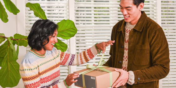 Woman getting a gift from her husband
