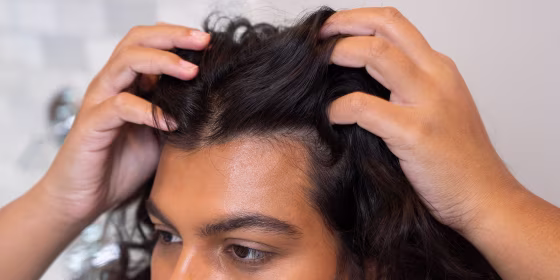 Close-up of a Woman touching her hair