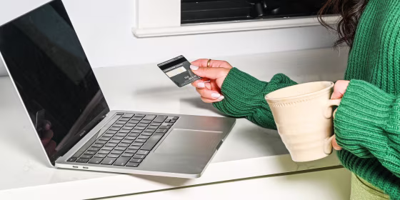 Woman on her credit card shopping online
