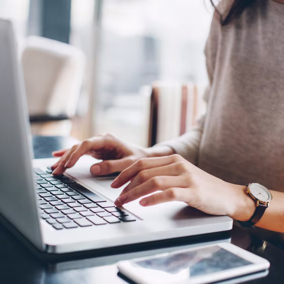 Woman using her laptop