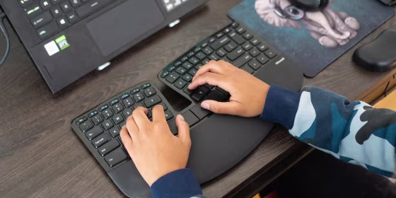 Writer Rebecca Isaacs using her Microsoft Sculpt Keyboard