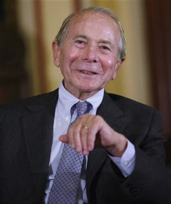 Maurice "Hank" Greenberg, former Chairman and CEO of AIG Insurance, is seen speaking at the Wall Street Journal conference in&nbsp;New York last year.&nbsp; AIG is suing Greenberg and six other former directors and officers, accusing them of breaching their fiduciary duty.