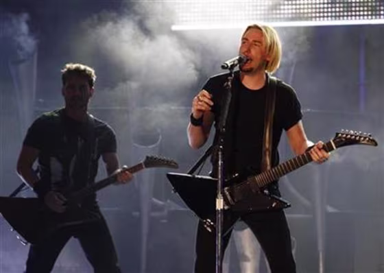 Frontman for Nickelback Kroeger performs during the 2009 MuchMusic Video Awards in Toronto