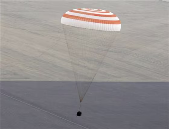 The Soyuz TMA-18 spacecraft is seen as it lands near the town of Arkalyk, northern Kazakhstan