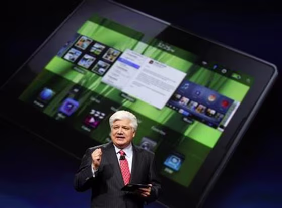 Mike Lazaridis, president and co-chief executive officer of Research in Motion, holds the new Blackberry PlayBook at the RIM Blackberry developers conference in San Francisco