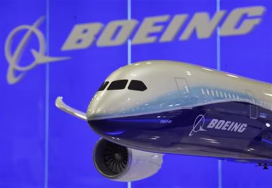 A model of Boeing 787-8 passenger plane is displayed inside its booth at the Asian Aerospace Show in Hong Kong