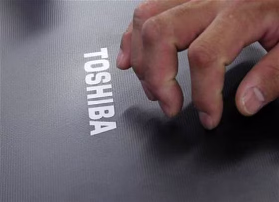 Toshiba's logo is seen on its laptop at an electronic shop in Tokyo
