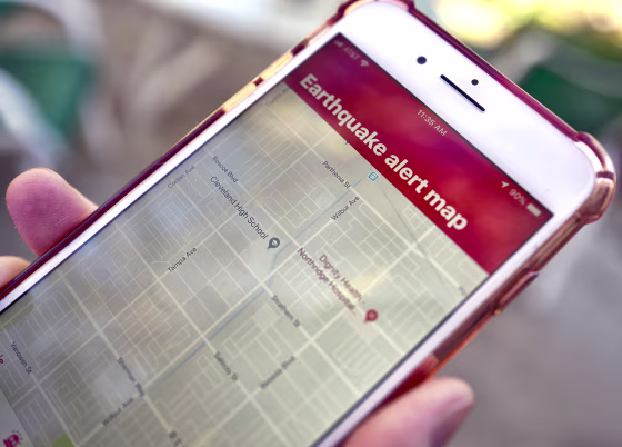 An earthquake warning application on their phone in Los Angeles on Jan. 3, 2019.
