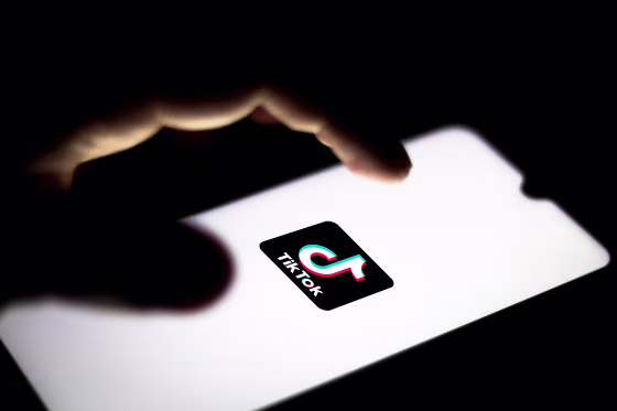 Image: The TikTok logo displayed on a smartphone.