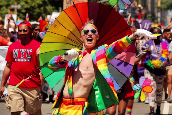 People march down Fifth Avenue in Manhattan during the 50th annual Pride parade in New York on June 30, 2019.