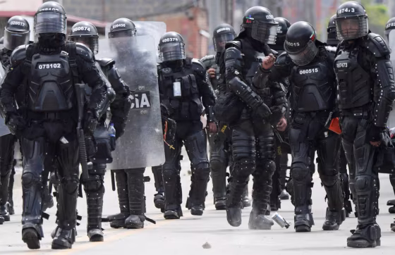 Riot police are seen during clashes with demonstrators during a protest against the government of Colombian President Ivan Duque, in Facatativa, Colombia, on May 31, 2021.