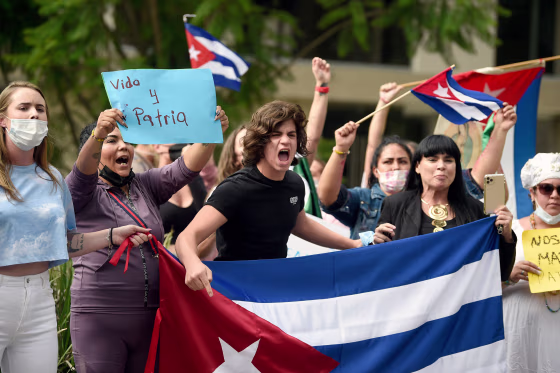 Image: Cuban citizens during demonstration against Cuban President Miguel Diaz-Canel's government outside the Cuban Embassy, in Mexico City on July 12, 2021.