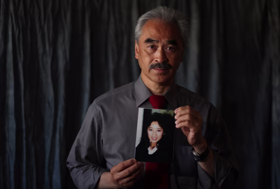 Harry Ong, brother of Betty Ong, who was a flight attendant on Flight 11 on September 11, 2001, holds a portrait of his sister, Betty Ong, at his home on Tuesday, September 6, 2011 in San Francisco, Calif. Ong was a flight attendant on Flight 11 on 9/11