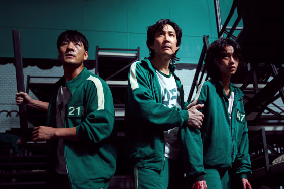 Park Hae Soo as Cho Sang-Woo, left, Lee Jung-jae as Seong Gi-Hun, center, and Jung Ho-yeon as Kang Sae Byeok in Netflix's "Squid Game."