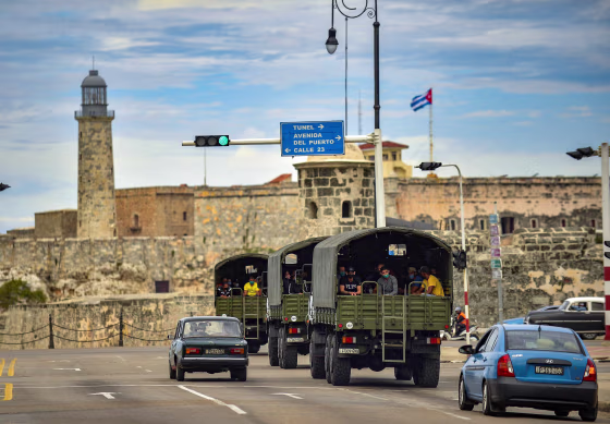 Image: Police vehicles drive along El Paseo del Prado street in Havana, on Nov. 15, 2021.