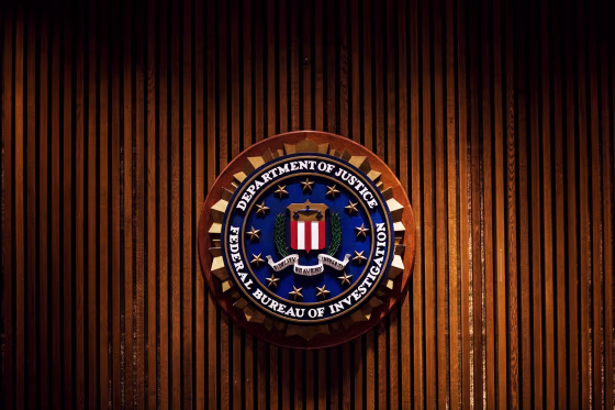A crest of the Federal Bureau of Investigation is on Aug. 3, 2007 inside the J. Edgar Hoover FBI Building in Washington, DC.