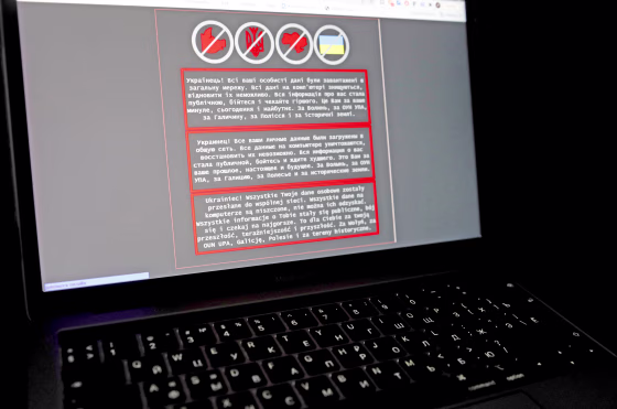 Image: A laptop screen displays a warning message on the official website of the Ukrainian Foreign Ministry, in this illustration