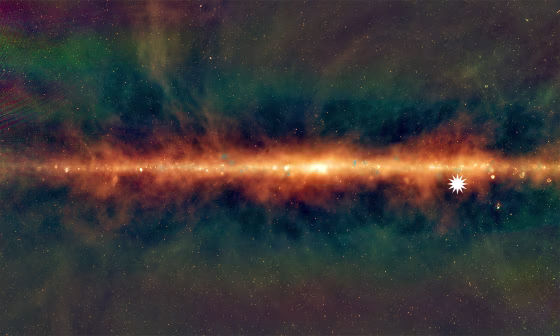 This image shows a new view of the Milky Way from the Murchison Widefield Array, with the lowest frequencies in red, middle frequencies in green, and the highest frequencies in blue. The star icon shows the position of the mysterious repeating transient.