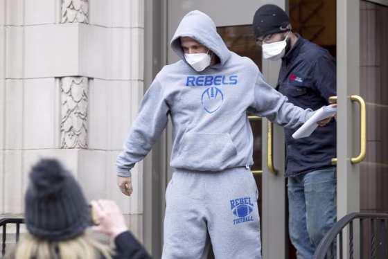 Image: Derrick Evans exits the courthouse after being arraigned on Jan. 8, 2021, in Huntington, W.Va.