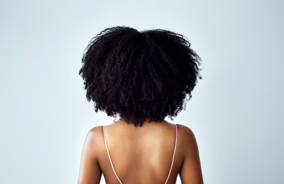young woman with curly hair