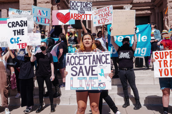 Image: Demonstrators protest a Texas policy to regard gender-affirming treatments for transgender youth as "child abuse," at the State Capitol in Austin, on March 1, 2022.