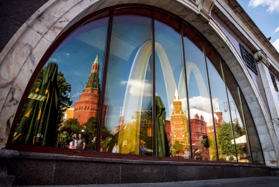 Image: The walls and towers of the Kremlin are reflected in a window of a McDonald's restaurant in Moscow, on Aug. 21, 2014.