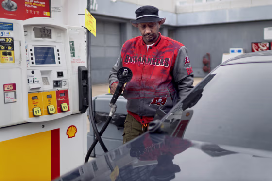 Osmond Malcom fills up his tank in Chicago.
