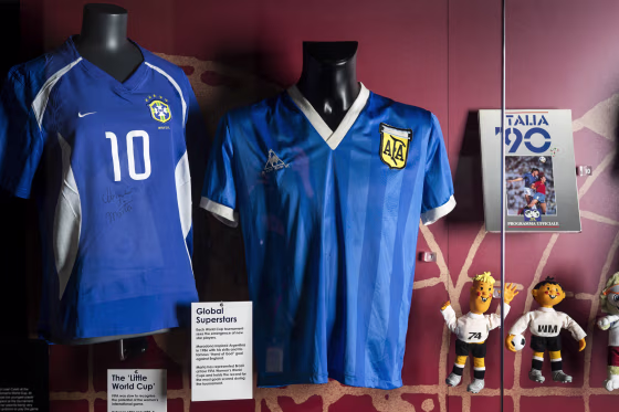 The soccer shirt, center, worn by Argentina's Diego Maradona in the 1986 World Cup quarterfinal against England is displayed at the National Football Museum in Manchester, England, on Nov. 26, 2020.