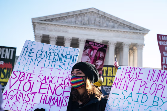 Abortion rights advocates and anti-abortion protesters demonstrate in front of the Supreme Court