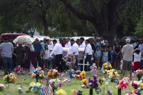 Image: Pallbearers carry the casket of Amerie Jo Garza to her burial site in Uvalde, Texas, on May 31, 2022.