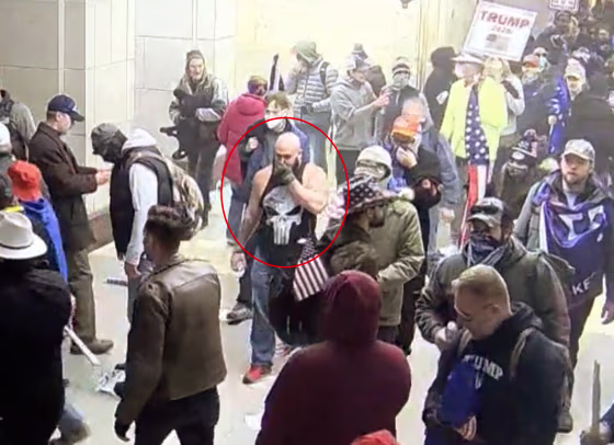 Joshua Pruitt, circled in red, storms the Capitol on Jan. 6, 2021.