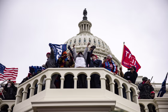 Image: Pro-Trump supporters on the steps of the Capitol in Washington following a rally with President Donald Trump on Jan. 6, 2021.