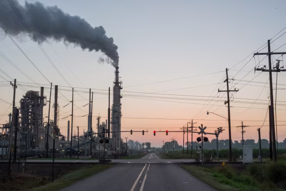 Image: Smoke billows from one of many chemical plants in the area known as "Cancer Alley: in Baton Rouge, La., on Oct. 12, 2013.