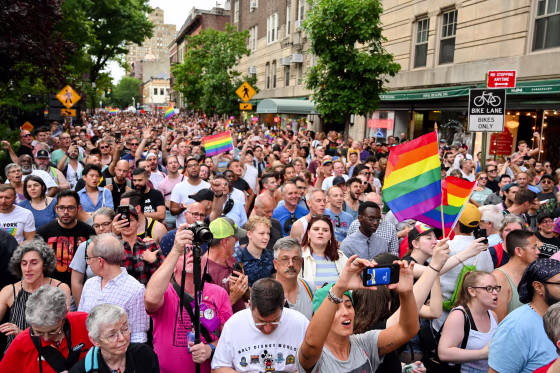 Crowds rally outside the Stonewall Inn for a rally to mark the 50th anniversary of the Stonewall Riots in New York City, on June 28, 2019.