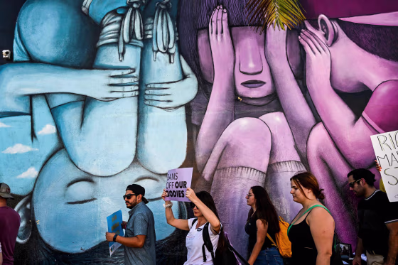 Abortion rights activists march in Miami on June 24, 2022.