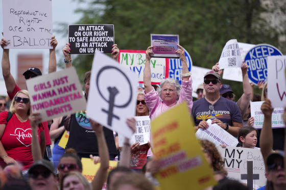 Abortion rights activists rally at the Indiana Statehouse in June, following Supreme Court's decision to overturn Roe v. Wade.
