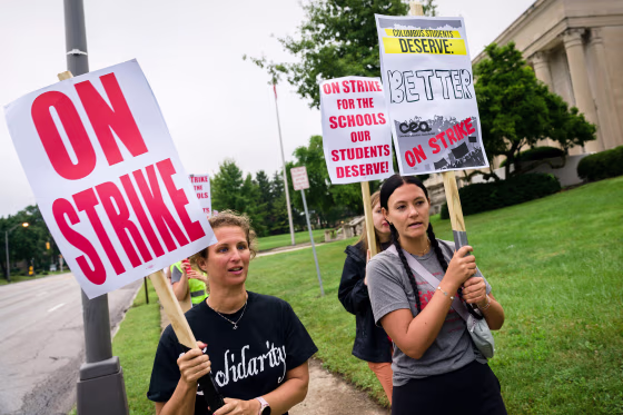 Members of the Columbus Education Association, the labor union representing nearly 4,500 teachers and other school staff in Columbus, Ohio, strike for the first time since 1975