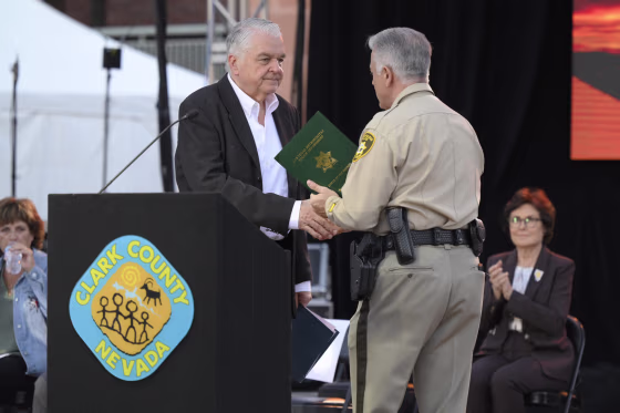 Nevada Gov. Steve Sisolak, left, and Clark County Sheriff Joe Lombardo