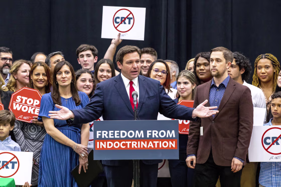 Gov. Ron DeSantis attends a news conference at Mater Academy Charter Middle/High School in Hialeah Gardens, Fla., on April 22, 2022. As Republicans and Democrats fight for control of Congress this fall, a growing collection of conservative political action groups is targeting its efforts closer to home: at local school boards. DeSantis endorsed a slate of school board candidates, putting his weight behind conservatives who share his opposition to lessons on sexuality and what he deems critical race theory.