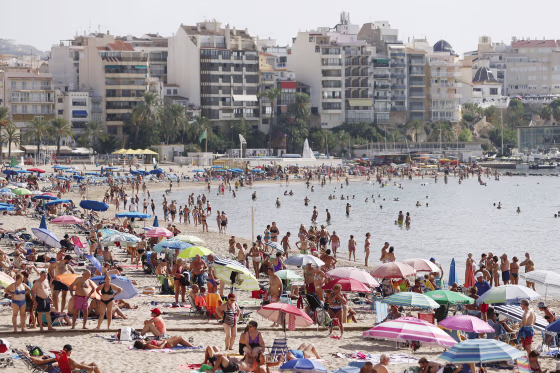 Beachgoers in Benidorm, eastern Spain, on Nov. 1, 2022.