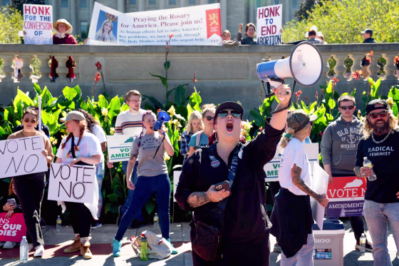 Image: Counter-protestors gather in front of a rally encouraging voters to vote yes on Amendment 2, which would add a permanent abortion ban to Kentuckys state constitution, on the steps of the Kentucky State Capitol in Frankfort, Ky., on Oct. 1, 2022.