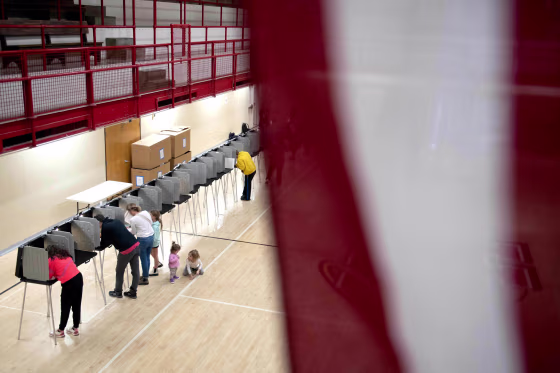 Voters cast their ballots at East High School in Denver on Nov. 8, 2022.