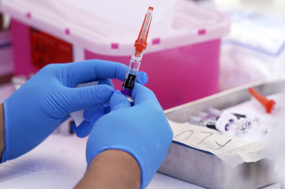 A flu vaccine is readied at the L.A. Care and Blue Shield of California Promise Health Plans' Community Resource Center in Lynwood, Calif., on Oct. 28, 2022.