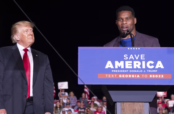 Donald Trump and Herschel Walker at a rally in Perry, Ga.