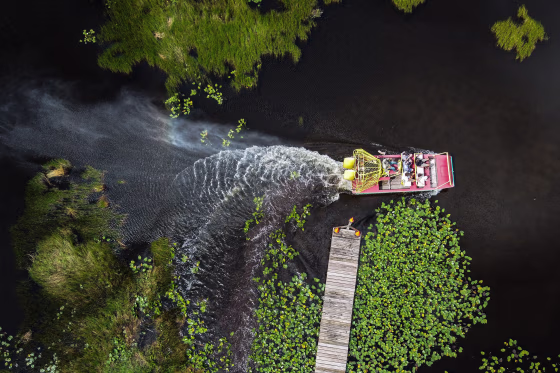 An airboat hovers over wetland in Everglades National Park, Fla., on Sept. 30, 2021.