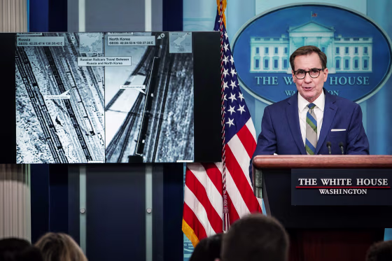 Image: National Security Council Coordinator for Strategic Communications John Kirby speaks during the daily press briefing in the Brady Briefing Room of the White House on Jan. 20, 2023, presenting images reportedly showing Russian railcars traveling between North Korea and Russia.