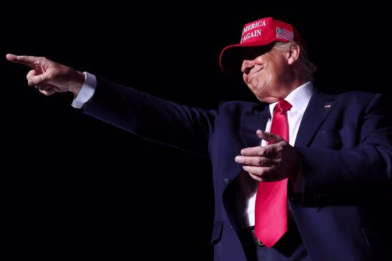 Donald Trump points at crowd at Pennsylvania rally.