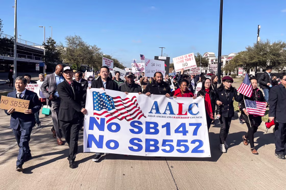 Protesters in Houston, Texas organize on Feb. 11, 2023 against proposed state Senate Bill 147, which would restrict citizens of China and three other countries from buying property in the state. 