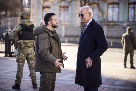 Image: President Joe Biden and Ukrainian President Volodymyr Zelensky talk during an unannounced visit in Kyiv, Ukraine, on Feb. 20, 2023.